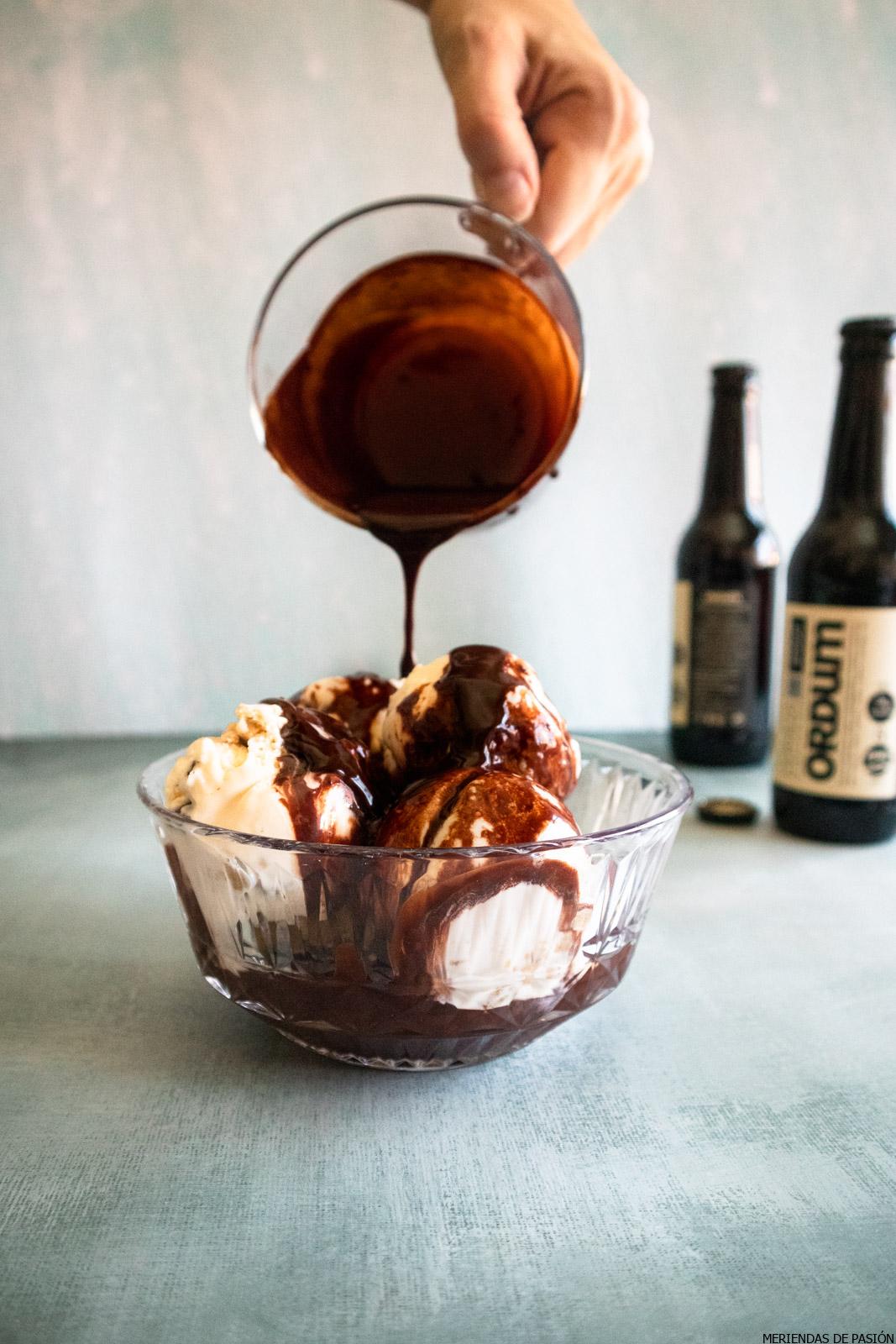 Chocolate Stout Sauce pouring on top of vanilla ice cream